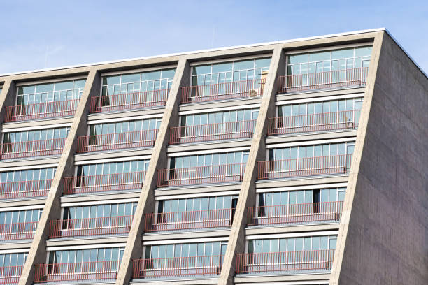 istock Facade of a terraced office building with balconies 1736194492