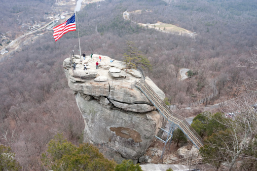 Top of the chimney rock in a state park in North Carolina (the people are not identifiable and serve for sense of scale)