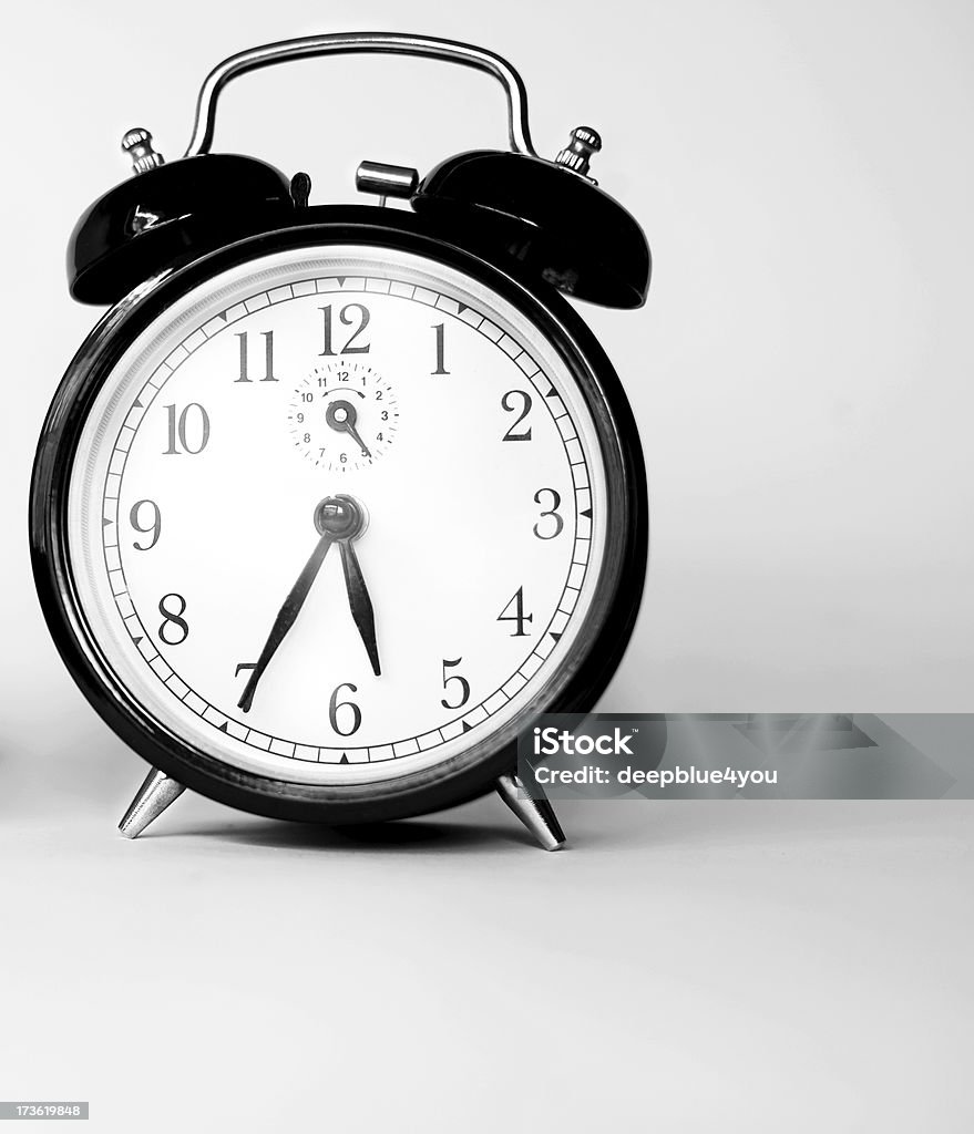 Black clock "Black clock, black and white" Alarm Clock Stock Photo