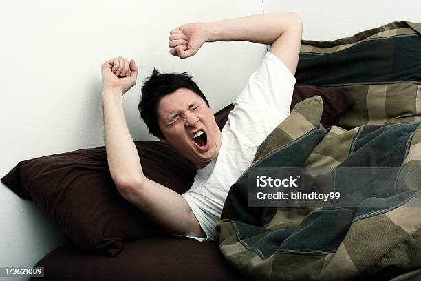 Yawning Stock Photo - Download Image Now - Adult, Adults Only, Bed - Furniture