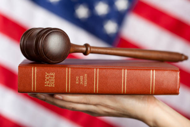istock Gavel on bible against US flag 173621023