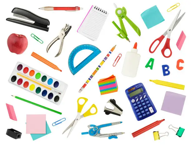 Arrangement of school supplies isolated on white.