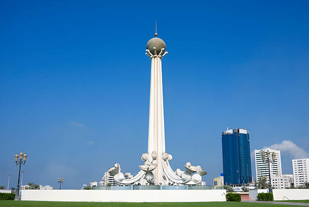 monument in sharjah city "monument in union square in sharjah city, united arab emirates" sharjah city stock pictures, royalty-free photos & images