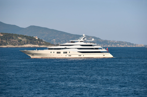 A large luxury yacht approaches the harbor of Monaco on the Cote daaAzurPlease see my other images of Monaco Monte Carlo here
