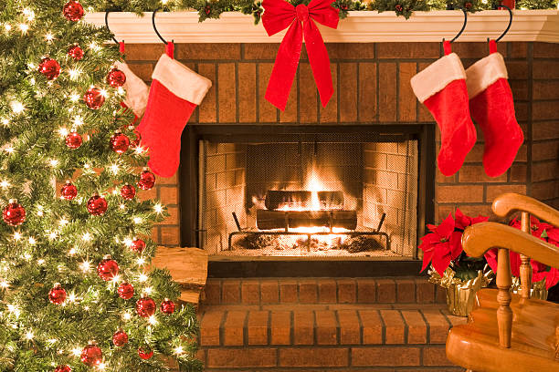 istock Decorated Christmas tree around the blazing fireplace with rocking chair 173623414