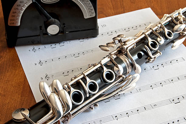 istock Clarinet on the table with music and metronome 173623453