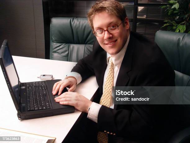 Happy Businessman On Laptop Stock Photo - Download Image Now - Board Room, Business, Business Meeting