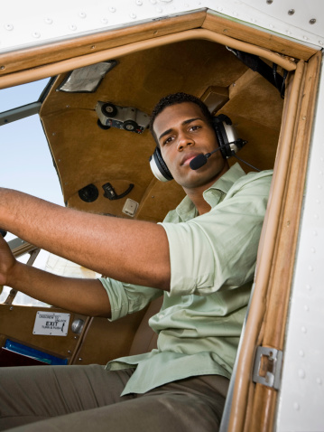 A private airplane pilot getting ready to take off.Our images are processed from
