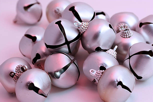 istock Silver Christmas bell Ornaments on white background with pink light 173624106