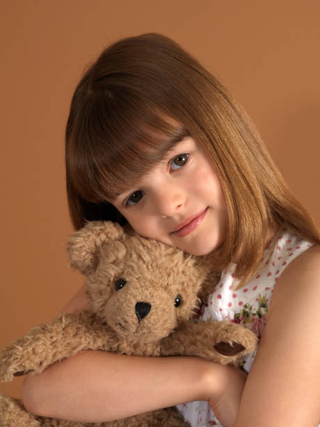 istock Girl and Teddy 173625025