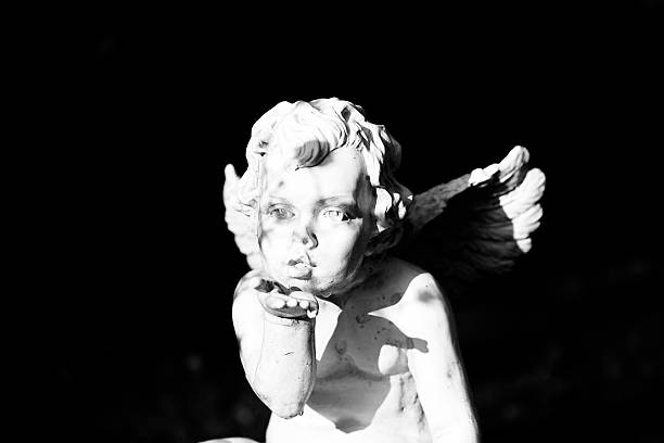istock baby angel blowing a kiss 173625314