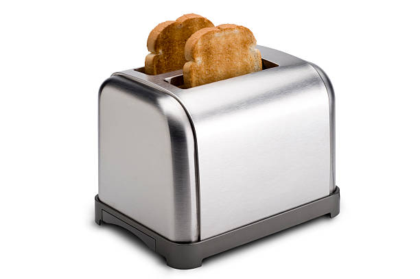 Stainless Toaster with Toast Toaster isolated on white with clipping path toaster stock pictures, royalty-free photos & images