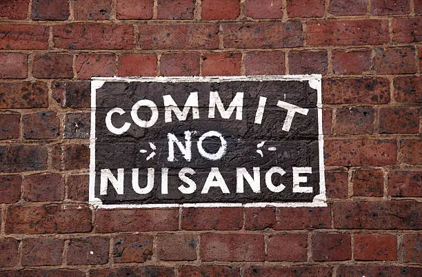 "Old street sign painted onto the wall encouraging good behaviour. Located in Melbourne, Australia."