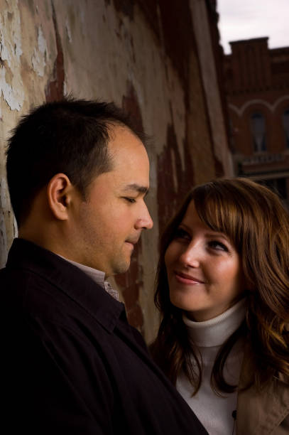 istock Ethnic couple looks at each other 173628170