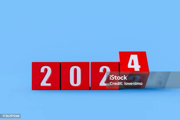 Flipping Of Cube Block For Change 2023 To 2024 Year Preparation For Merry Christmas And Happy New Year Concept Stock Photo - Download Image Now