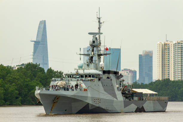 HMS Spey Offshore Patrol Vessel (P234) Of United Kingdom Royal Navy Moving On River. Ho Chi Minh City, Vietnam - February 11, 2023 : HMS Spey Offshore Patrol Vessel (P234) Of United Kingdom Royal Navy Moving On River. frigate stock pictures, royalty-free photos & images