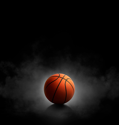 istock basketball with on black background with smoke 1736319857