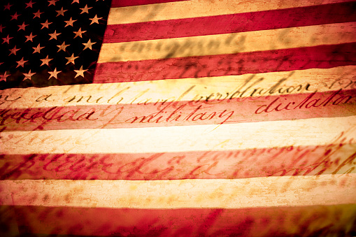 Patriotic Composition. US Flag and antique writing about the military.