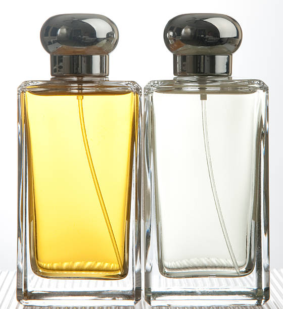 istock Two Perfume Bottles, Vanity, Beauty Product, Amber Liquid, Isolated Object 173632373