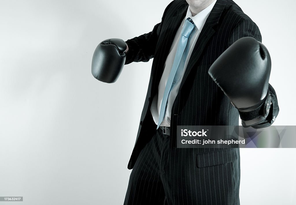 Homme d'affaires avec des gants de boxe - Photo de Affaires libre de droits