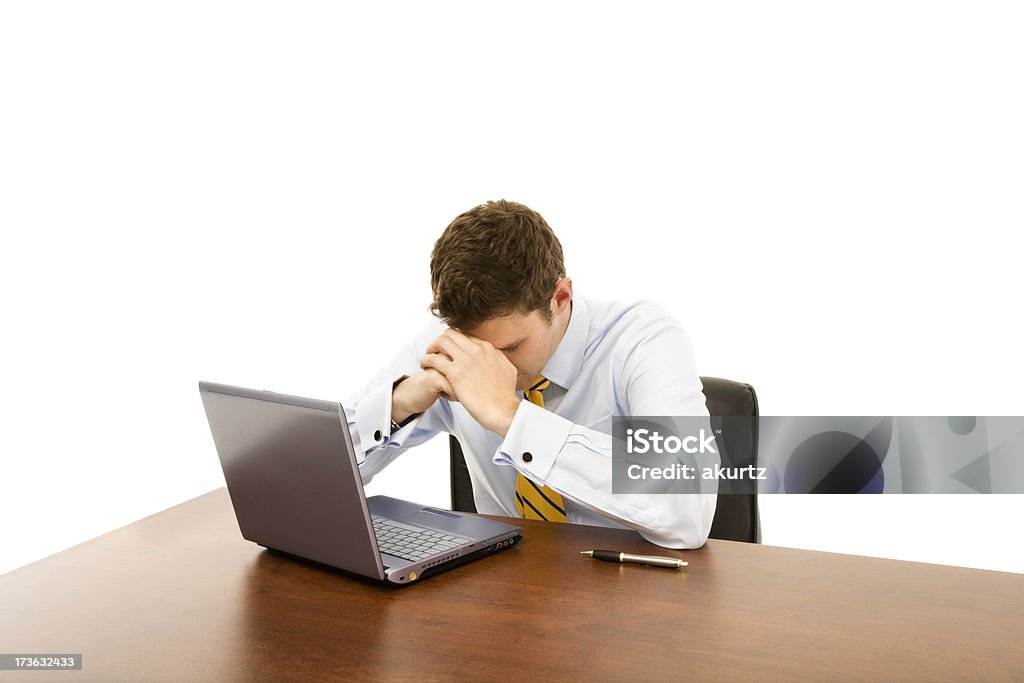 Business man completely devastated laptop computer desk isolated White Background Stock Photo