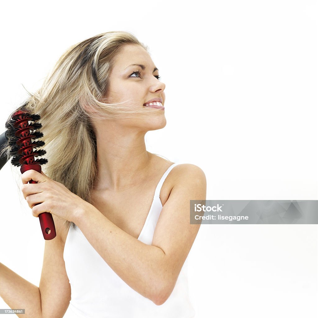 Donna hairdrying - Foto stock royalty-free di Sfondo bianco