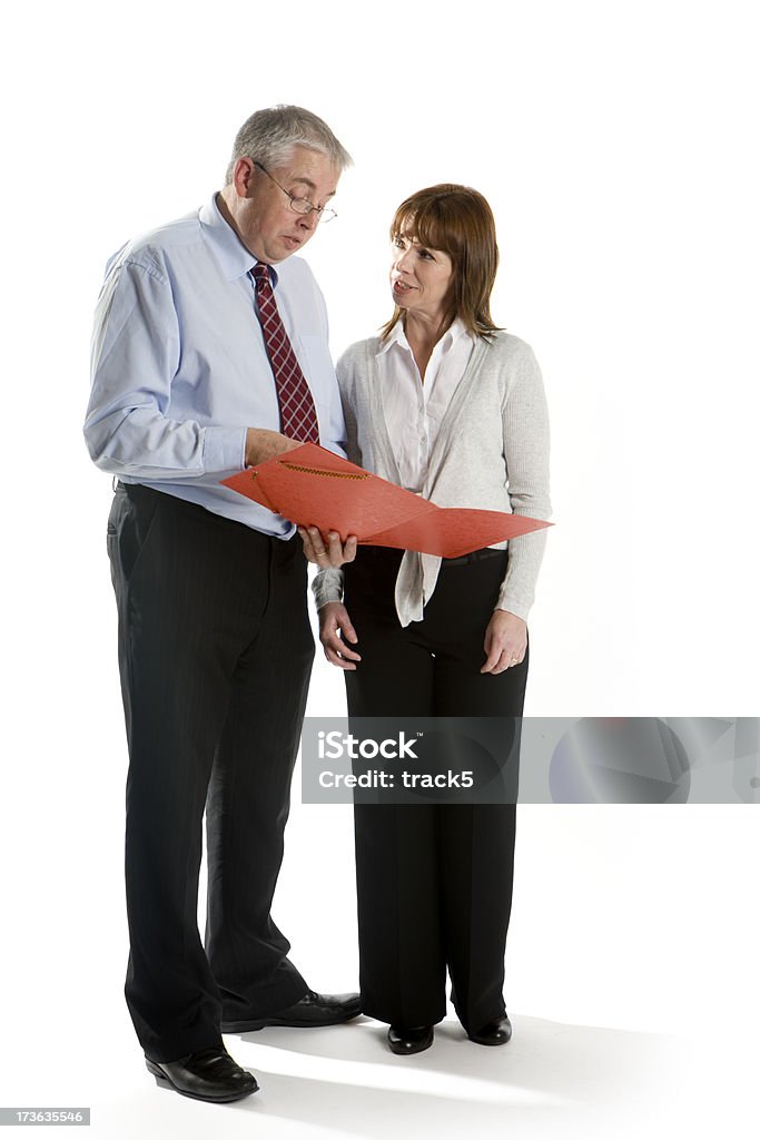 business arrangement "A pair of white collar workers running through their figures.Full body, studio shot isolated against a white background." Cut Out Stock Photo