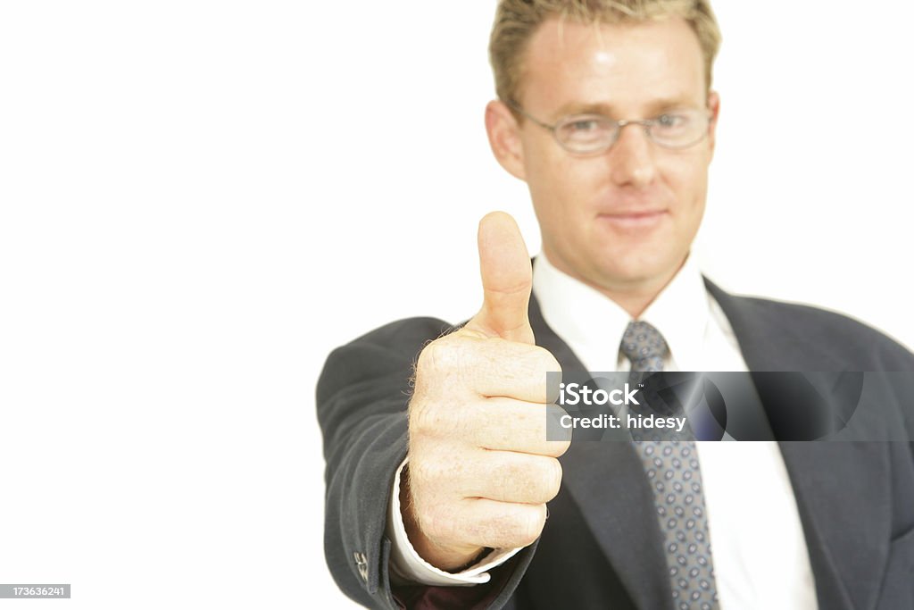 Great Job Man gives the thumbs up.  Focus on hand Adult Stock Photo