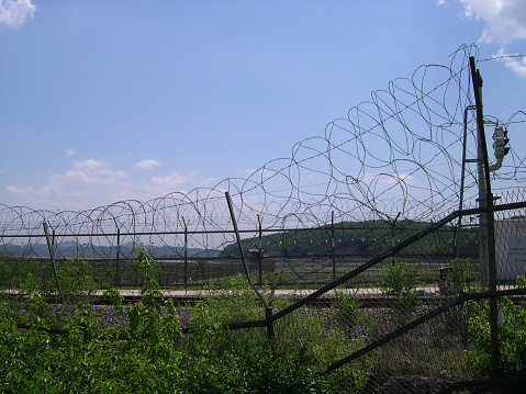 Barbed wire and guardpost at the DMZ, Panmunjeom, South Korea.