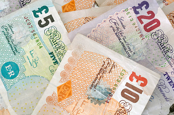 istock background of english sterling pound notes 173636879