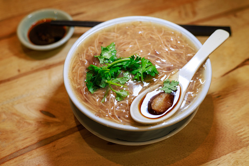 Traditional Taiwanese street food, vermicelli in oyster starched soup, featuring thin noodles