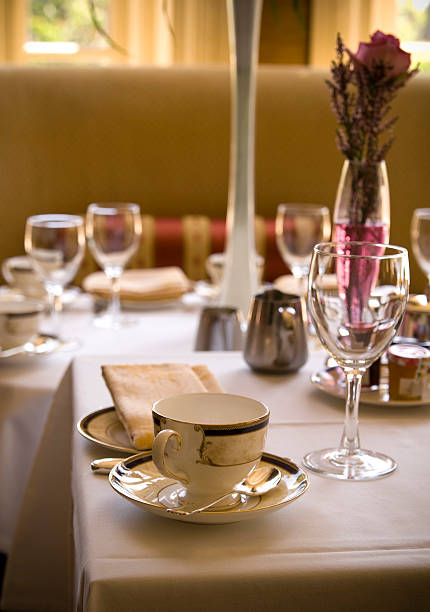 istock Elegant Afternoon Tea Dining Table, Vase, Cups & Place Setting 173637655