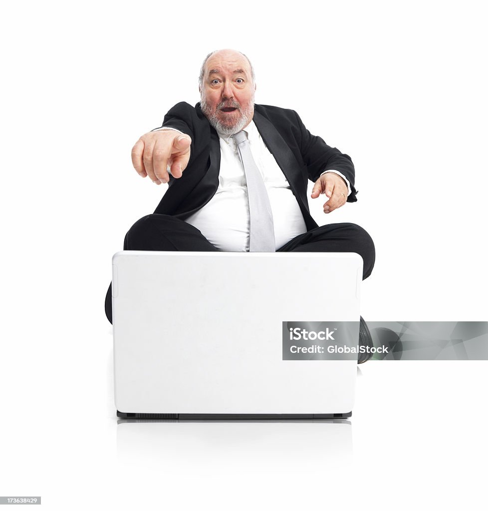 Empresário apontando, sentado na frente do computador portátil - Royalty-free Gordo Foto de stock