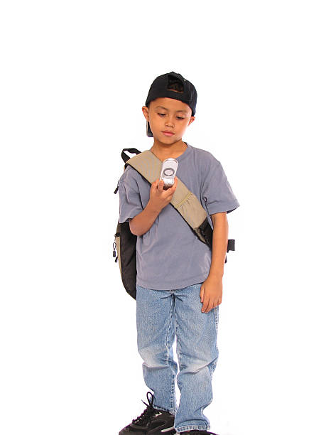 School Boy on Cellular Phone 2 stock photo