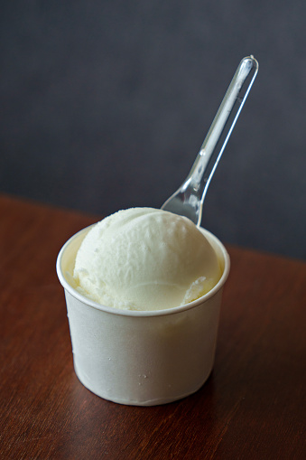 Homemade vanilla ice cream served in a paper cup