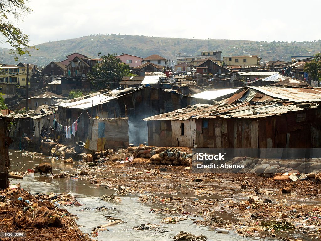 The Freetown slum in Kroo Bay that is suffering a flood The crocodile river flows through the biggest slum of Freetown - Kroo Bay (Sierra Leone) Africa Stock Photo