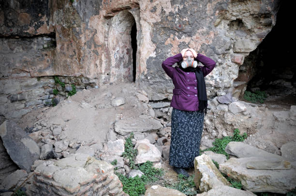 istock the woman between debris after war 173644045