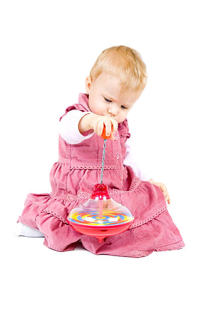 Small girl with toy isolated stock photo