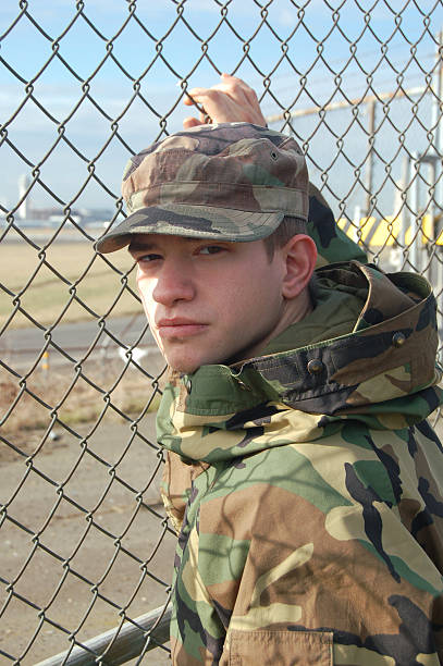 istock Soldier at Fence 173644612