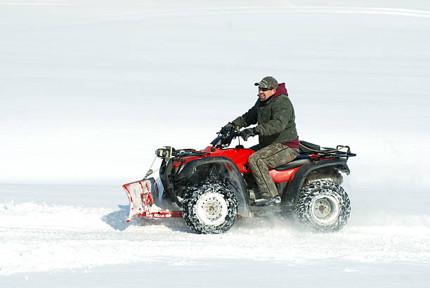 istock Man Plowing on Four Wheeler 173644762