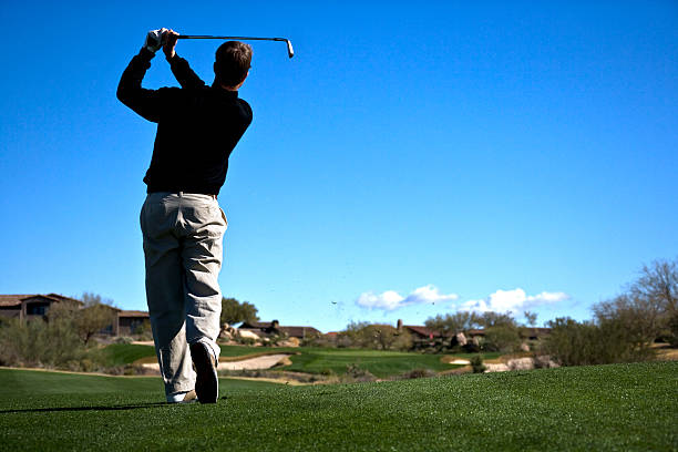 istock Male Golfer Takes a Divot 173645359