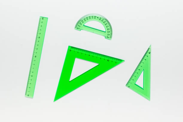 istock A set of green rulers on a white background. 1736463171