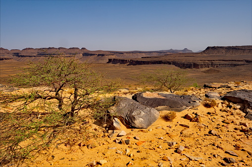 Africa, Mauritania. Giant fragments of rocks of volcanic origin on the rocky plateau of the Agrour Natural Park on the southwestern edge of the Sahara Desert.