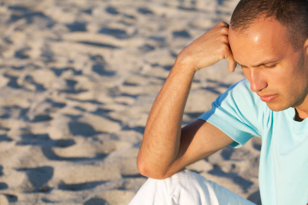 istock close of young sad man 173648931