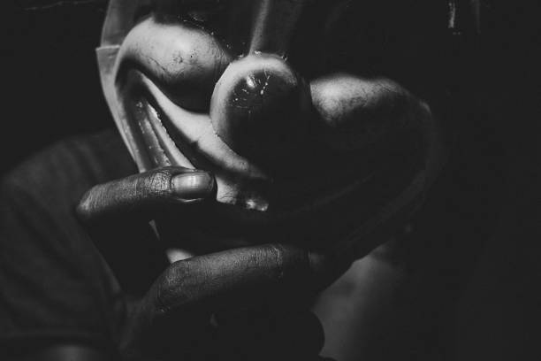 istock Creepy clown in the dark 1736497653