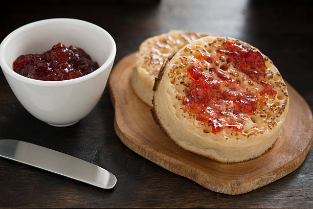 Toasted Buttered Crumpets with Strwaberry jam