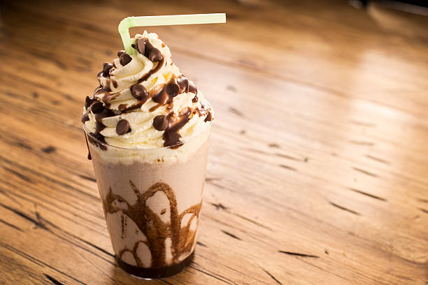 Chocolate Mint Chocolate Milk Shake - Frappe topped with whipped cream and chocolate sauce with chocolate pieces. chocolate shake stock pictures, royalty-free photos & images