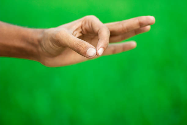 istock A human hand show finer and green background 1736511568