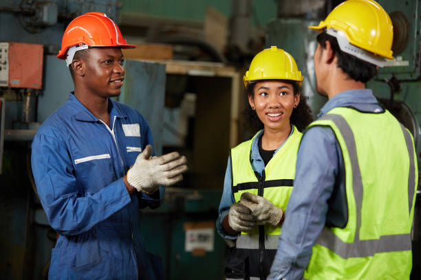 istock workers or engineers talking about work and project in the factory 1736515910