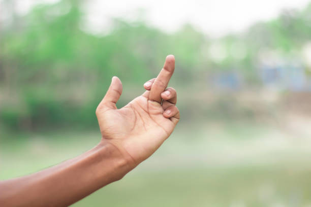 istock A human hand show finer and green background 1736516462